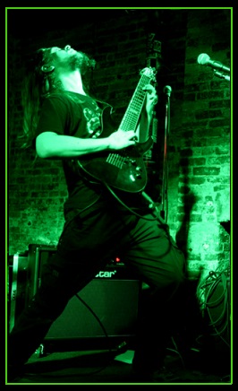 Pete Lesko performing guitar